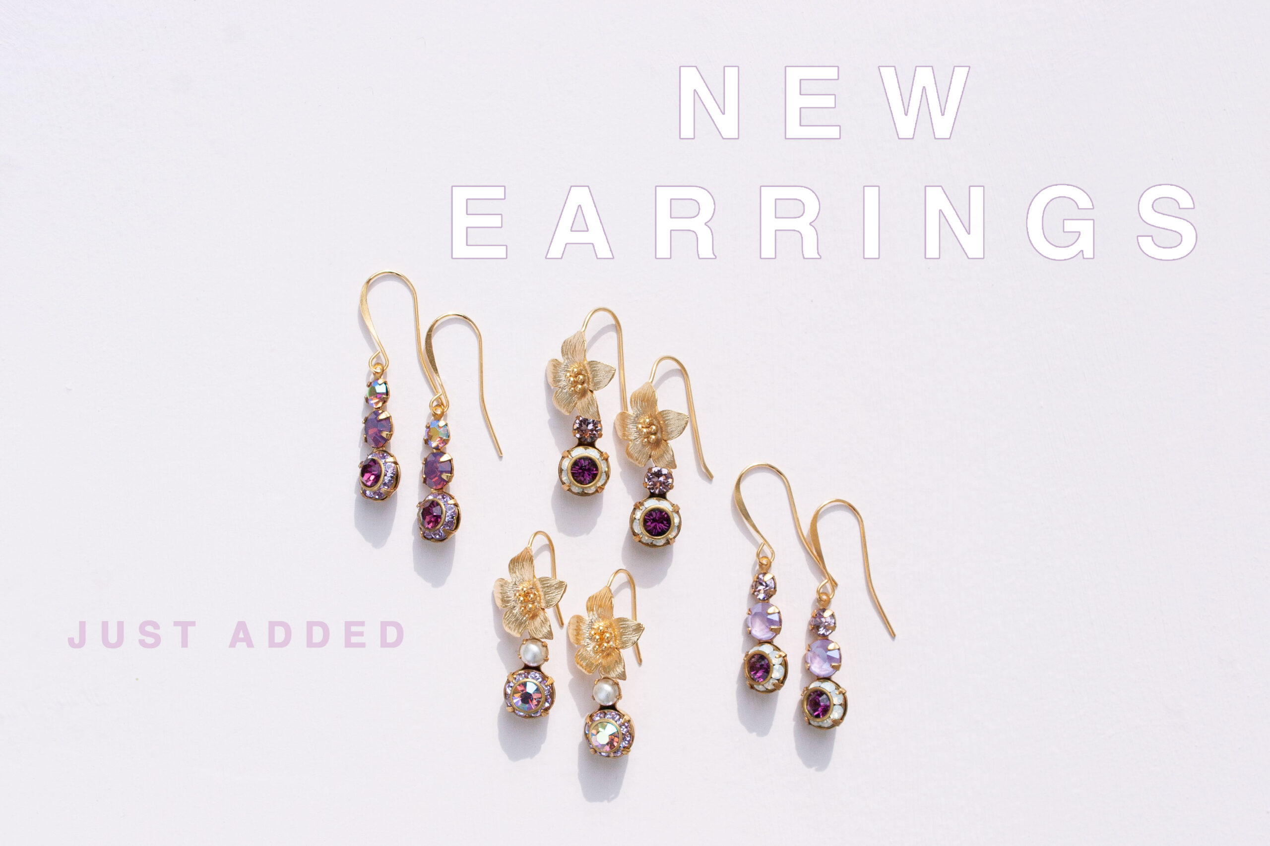 new earrings just added purple lavender rhinestone earrings Sunburst Earrings - Featured on the Daily Connoisseur Elegant Dressing for Dressy Occasions video